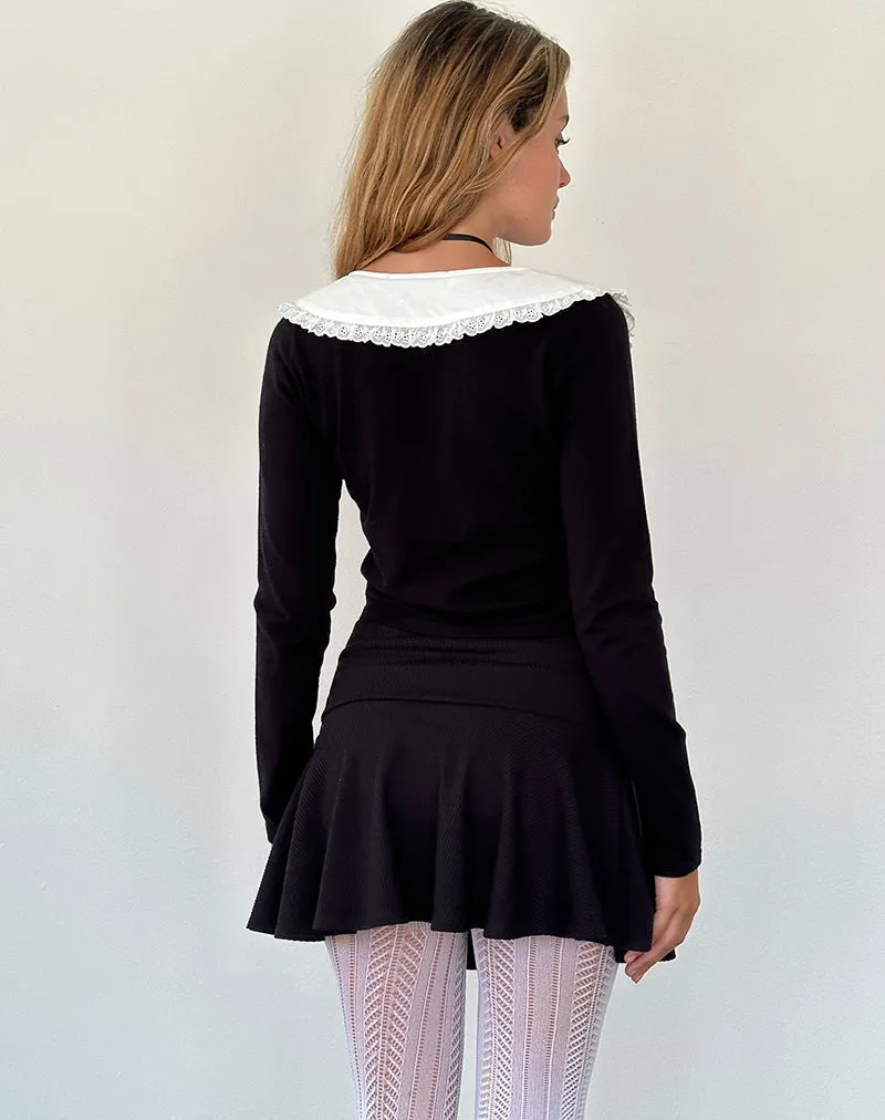 Jodine Knitted Cardigan in Black with White Frill