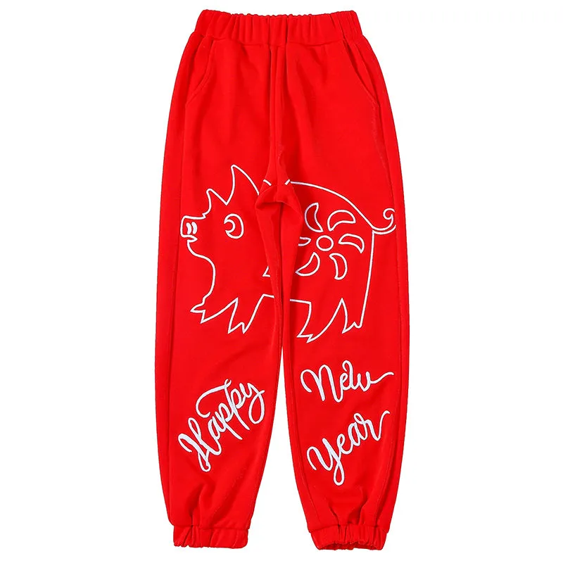 MAXIMARTIN MIXED PATTERN NEW YEAR RELAXED JOGGER PANTS IN RED