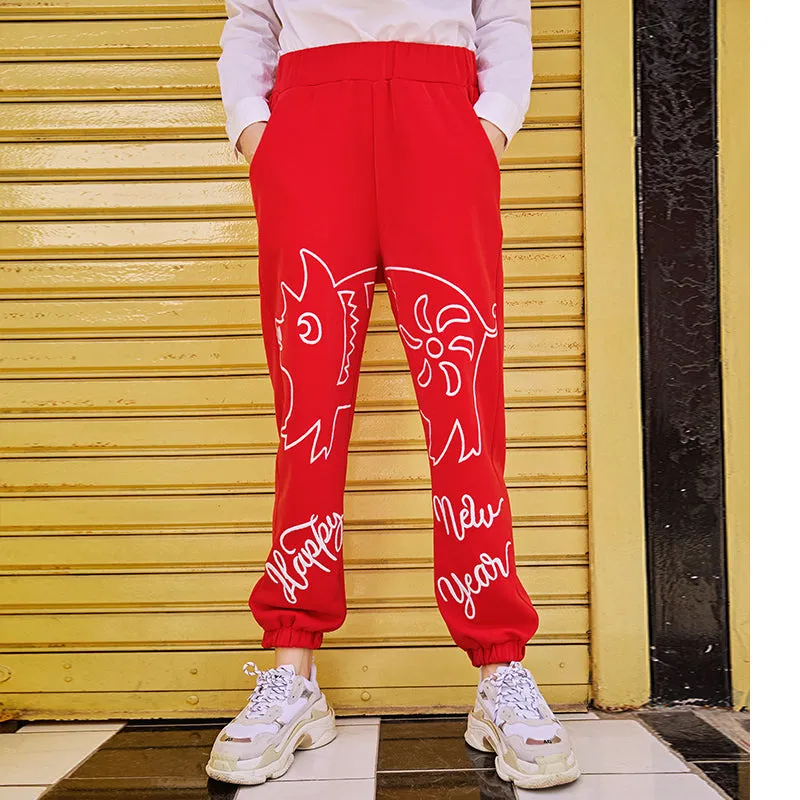 MAXIMARTIN MIXED PATTERN NEW YEAR RELAXED JOGGER PANTS IN RED